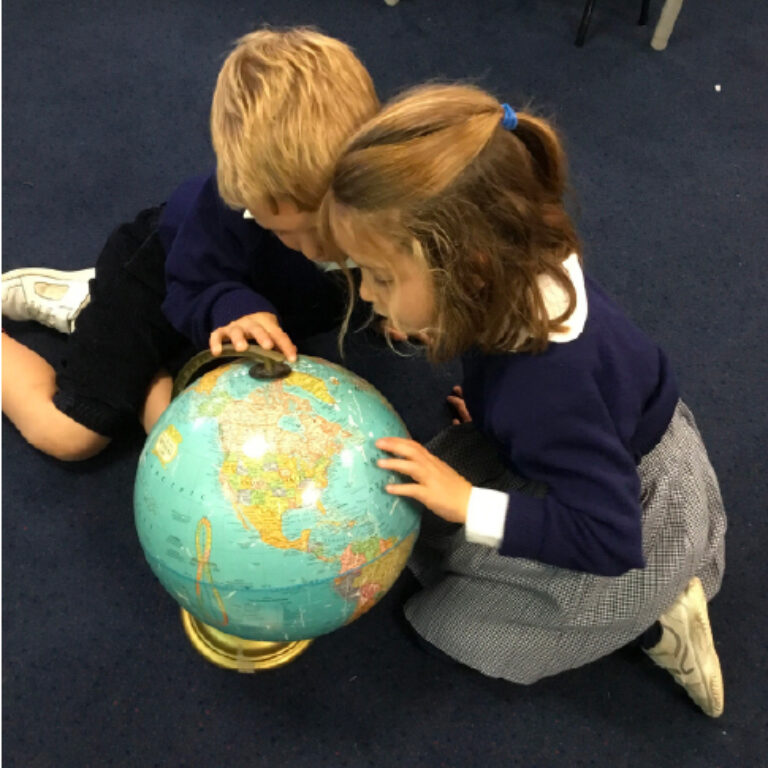 students with a globe