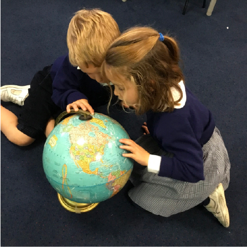 students with a globe