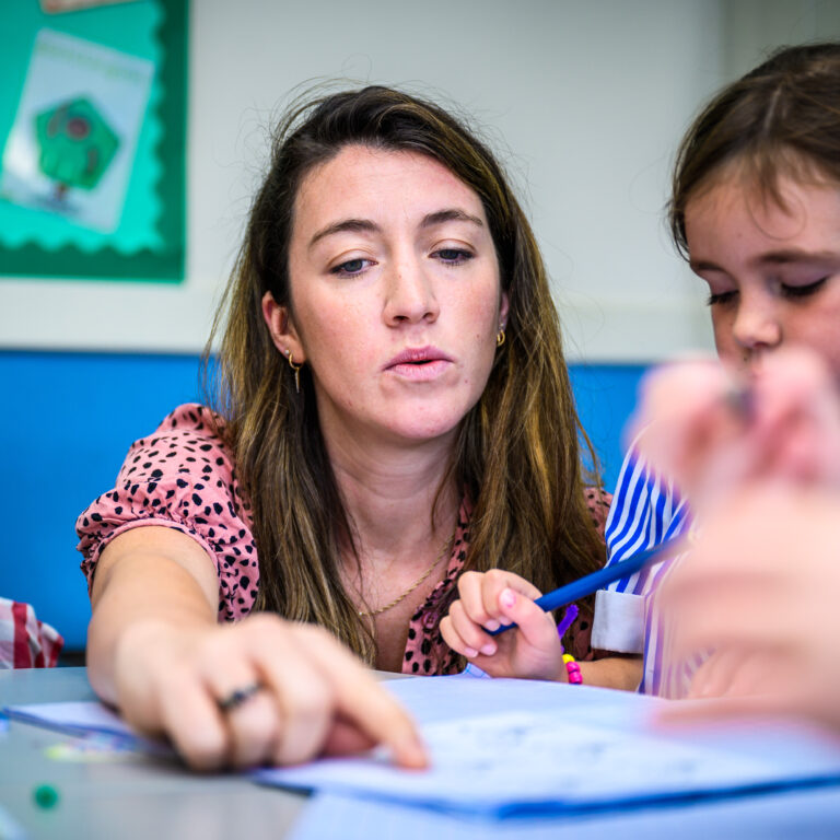 teacher with her students