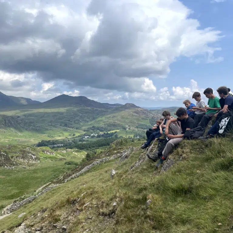 students looking at the mountains