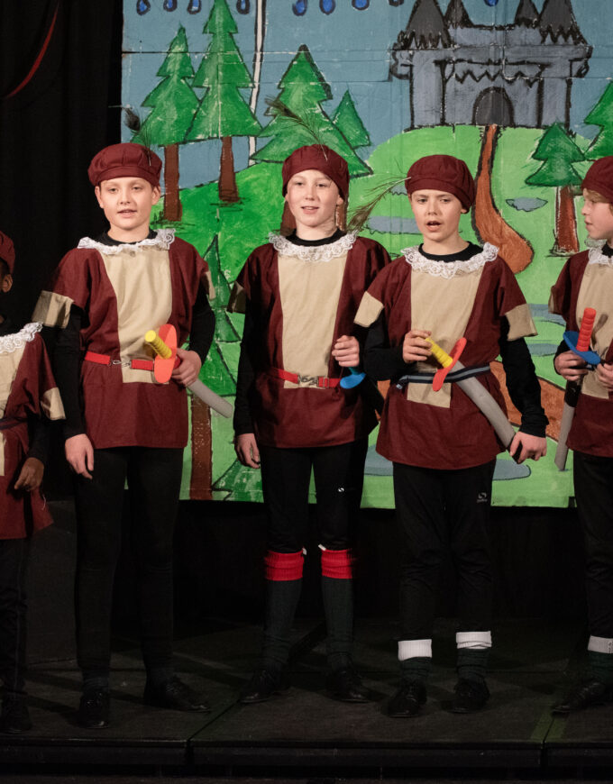 students dressed for a play