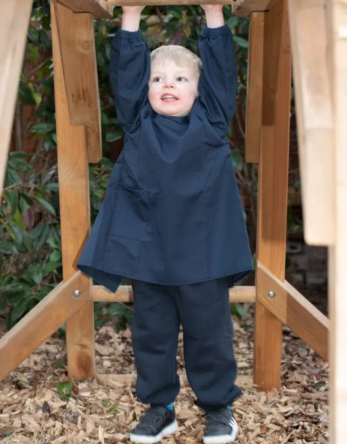 boy on a climbing frame