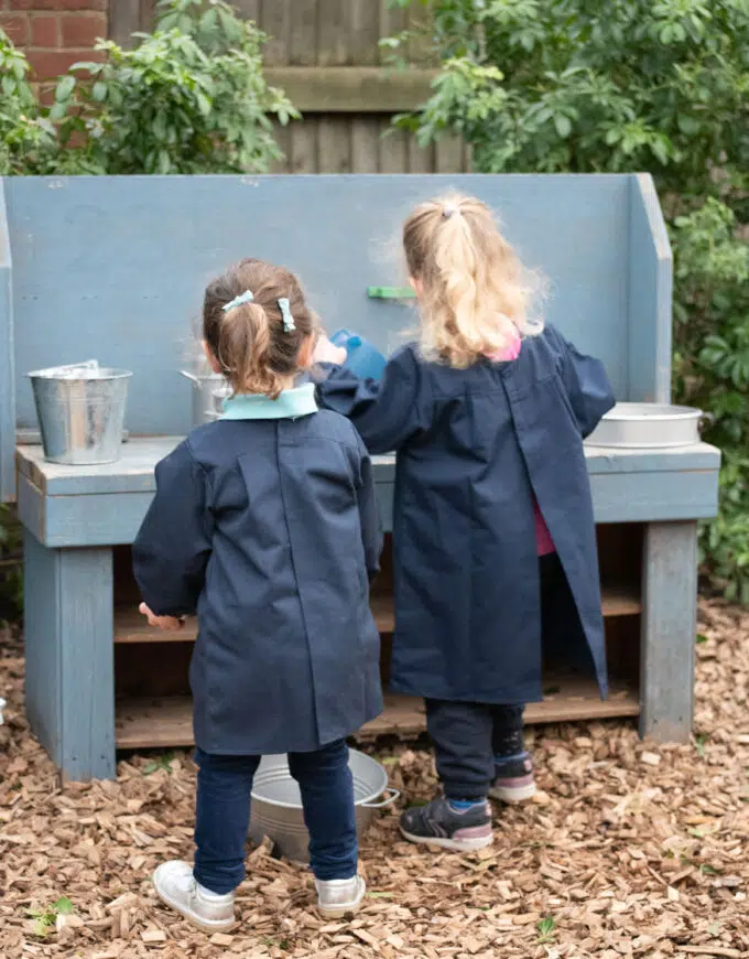 students using a mud kitchen