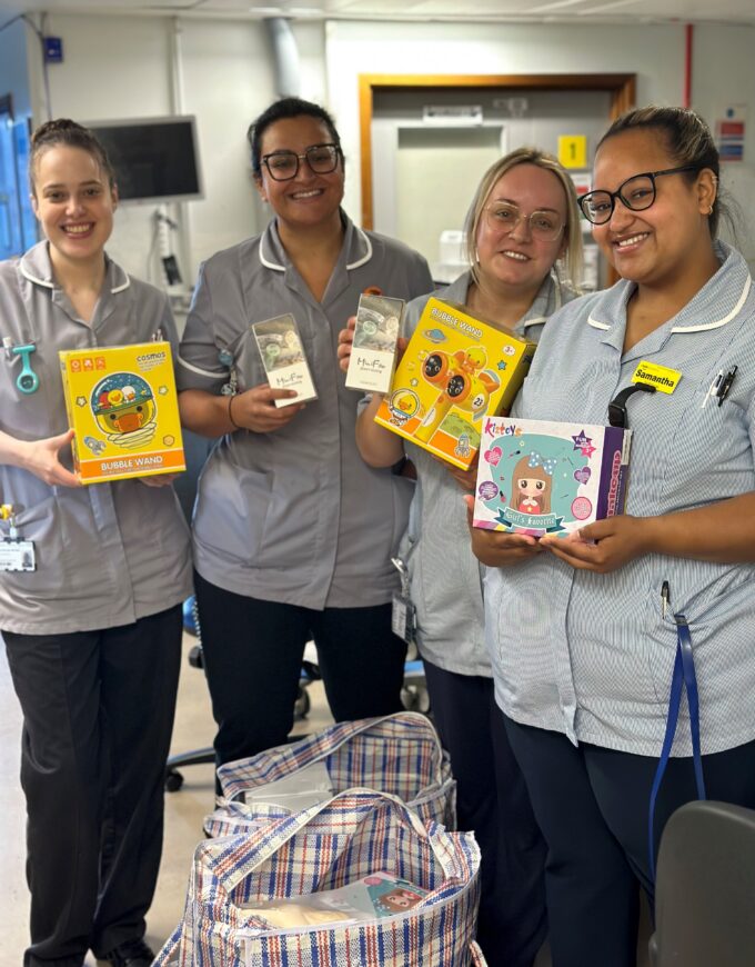 nurses holding gifts