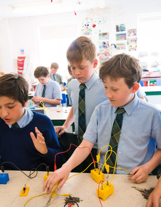 boys working with circuits