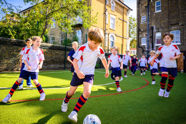 boys playing football