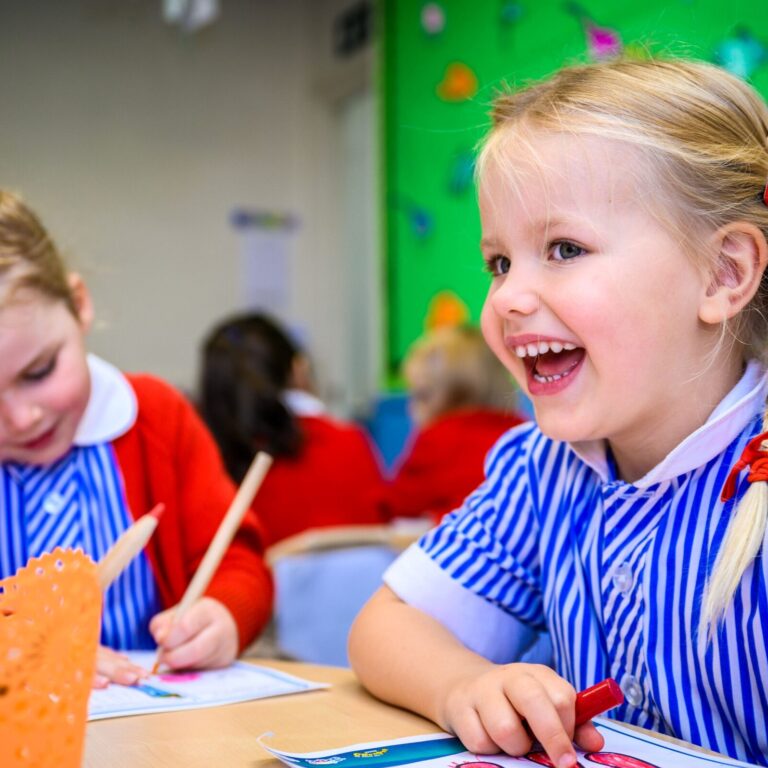 girls sat at their desks