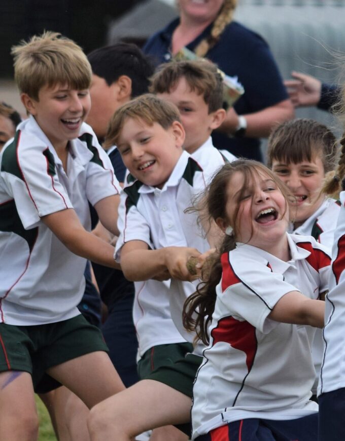 students playing tug of war
