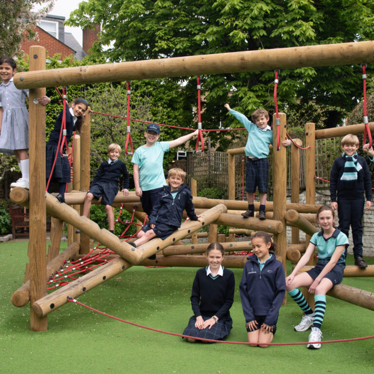 students on a climbing frame